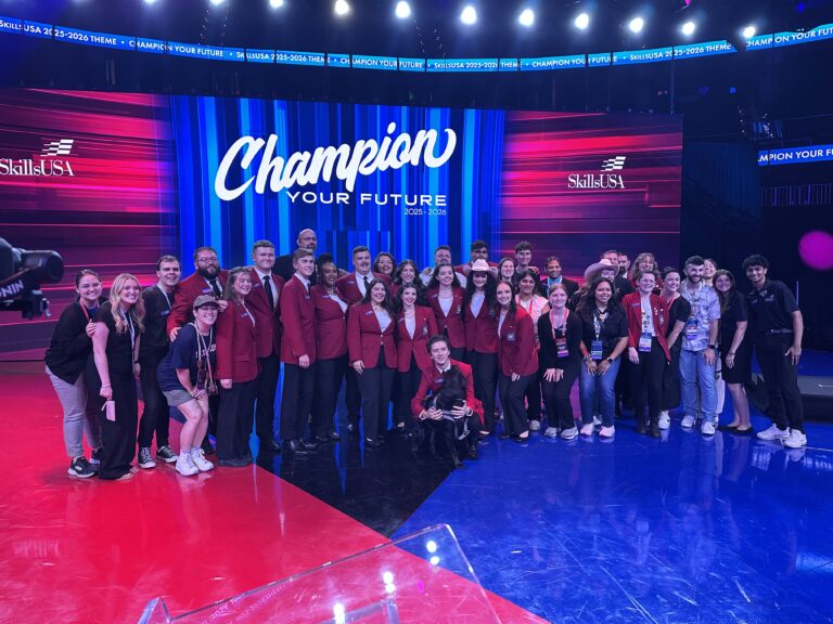 SkillsUSA national student officers and advisors gathered onstage